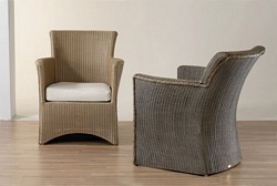 Lloyd Loom armchair with cushion available in natural and brown wash