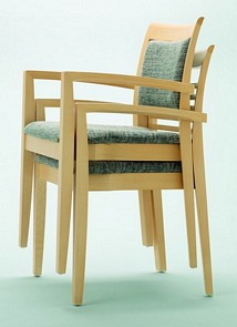 Wood stacking armchair upholstered in choice of fabric and wood polish