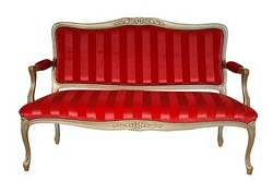 Traditional two seater sofa upholstered in choice of fabric and wood polish